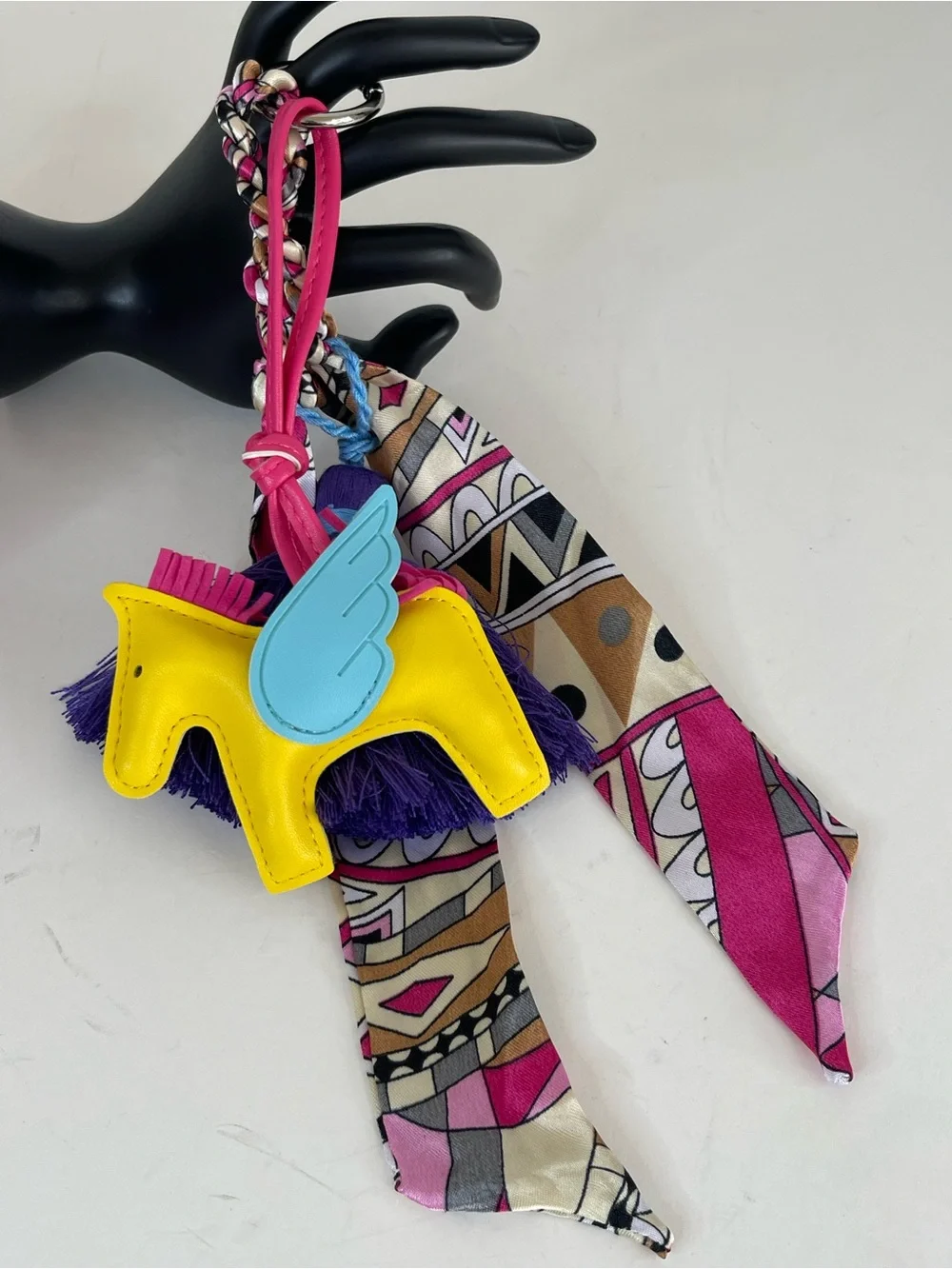 Bright Yellow Pony Bag Charm with Blue Wings and Purple Tassel